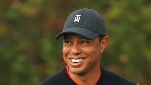 Tiger Woods is awake and recovering in hospital following car crash