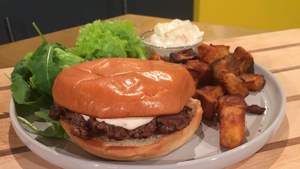 Lilly Higgin's smash burgers with home fries and kimchi mayonnaise.