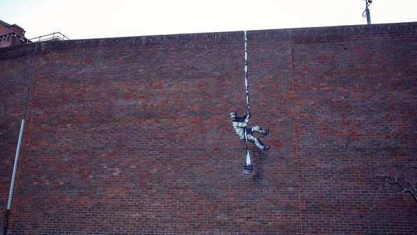 A new painting appeared on the side of a former prison in Reading overnight on Sunday