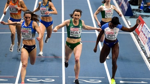 Phil Healy winning her semi-final in the 400m from Andrea Miklos of Romania, left, and Amarachi Pipi of Great Britain