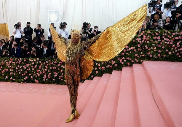 Billy Porter Wore a Gold Pantsuit With Wings to the Met Gala