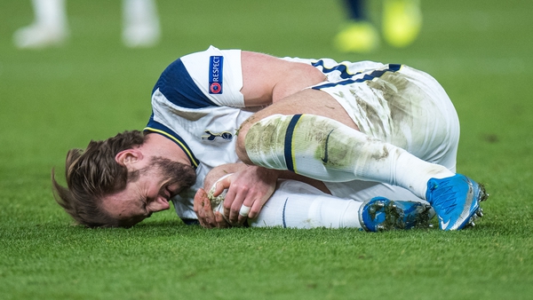 Harry Kane on the ground after taking a bang on the knee against Zagreb
