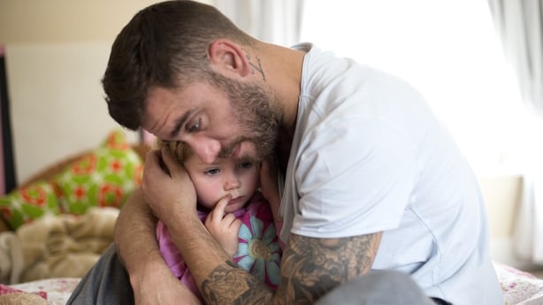 father and daughter hugging