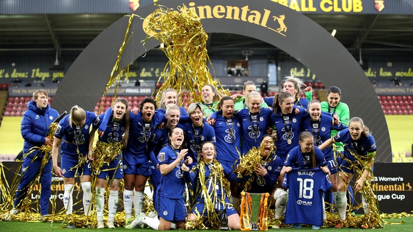 Chelsea players celebrate with the FA Women's Continental Tyres League Cup