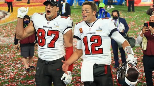 Rob Gronkowski (L) and 
Tom Brady celebrate winning Super Bowl LV with the Tampa Bay Buccaneers last month