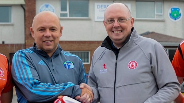Damian Harvey alongside former Waterford hurling manager Derek McGrath at a previous Tyrone GAA coaching seminar in 2019