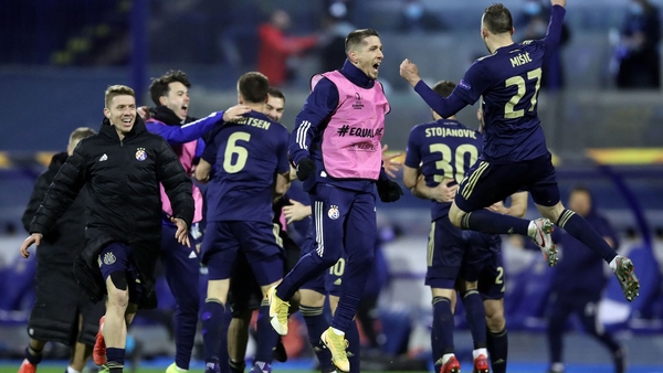 Dinamo Zagreb's players celebrate wildly at the final whistle