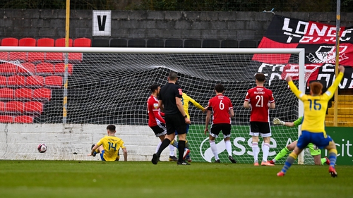 Dylan Grimes' shot from a narrow angle put Longford Town in front