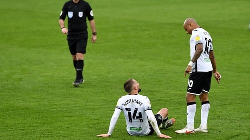 Hourihane after going down injured in the first-half