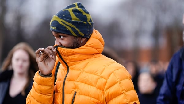 Frank Ocean rocking an orange puffer jacket and beanie from Arc'Teryx at Paris Fashion Week in January 2019. Photo: Edward Berthelot/Getty Images