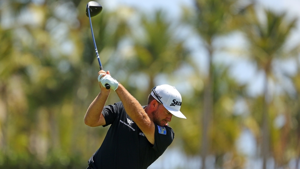 Graeme McDowell plays his tee shot on the 16th hole