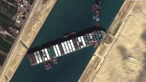 A container ship became jammed and blocked traffic for six days in the Suez Canal in March