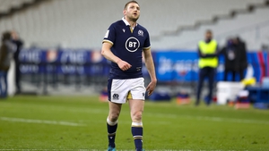 Finn Russell leaves the pitch after his red card