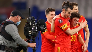 Gareth Bale celebrates the victory with match-winner Daniel James
