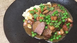 Wade's slow braised shoulder of lamb, peas and smoked bacon