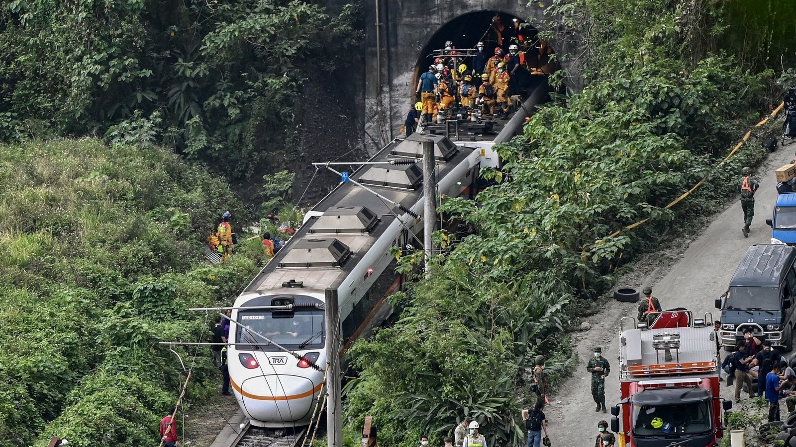 At Least 51 People Killed In Taiwan Train Derailment - roblox train crashes on a bridge