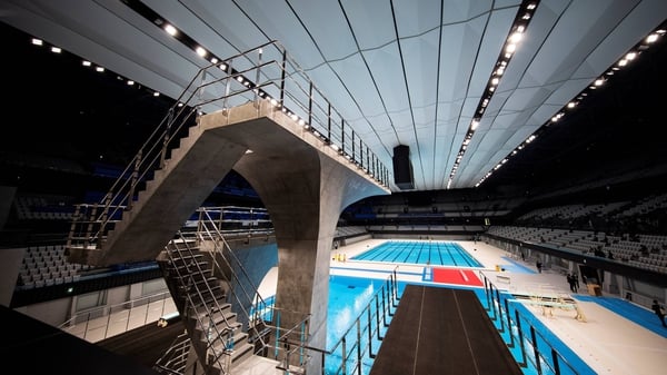 A view of the the diving platform and swimming pool at the Tokyo Aquatics Centre