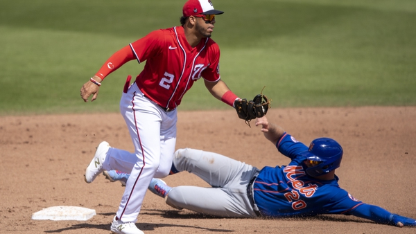 Washington's Luis Garcia (2) tags out Mets infielder Pete Alonso during a spring training game last month.