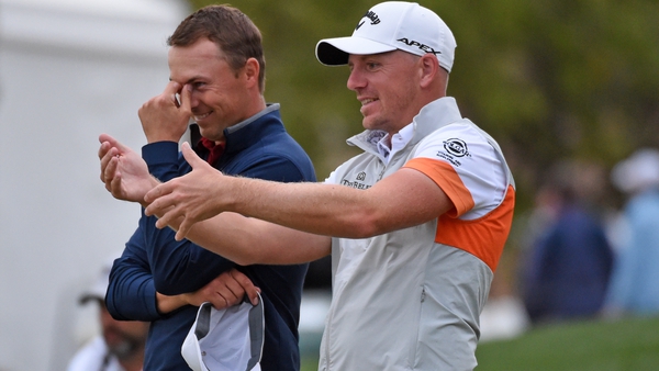 Leaders Matt Wallace and Jordan Spieth share a joke during the third round in Texas