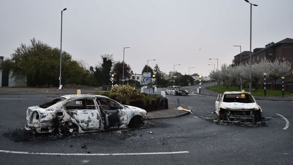 Burnt out cars at the Cloughfern roundabout following overnight violence in Belfast