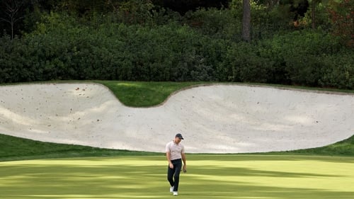 Rory McIlroy reacts to his putt on the 13th green during the final round last year's Masters