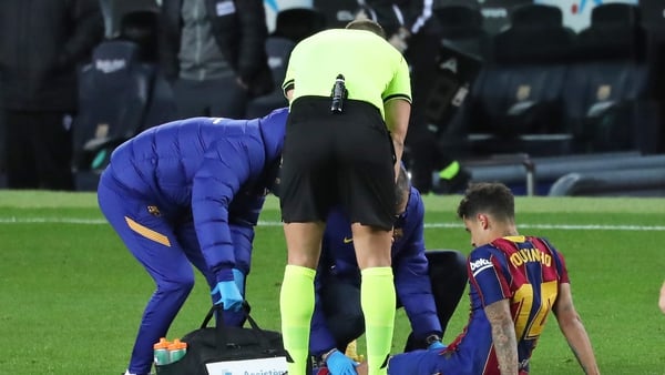 The Brazilian receiving treatment on the pitch against Eibar