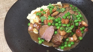 Wade Murphy's slow braised shoulder of lamb, peas and smoked bacon