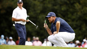 Shane Lowry had to grind it out today, but he keeps his tournament alive
