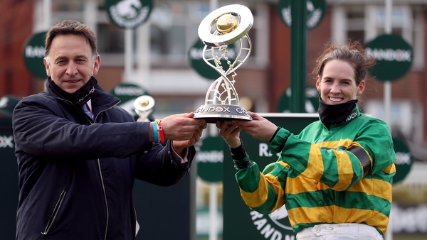 Henry de Bromhead and Rachael Blackmore pose with the trophy after Minella Times' heroics in the world's most famous steeplechase