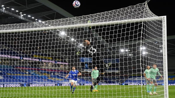 Everton goalkeeper Robin Olsen makes a save
