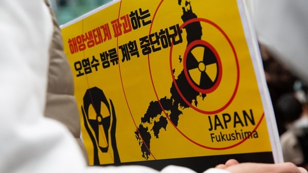 A member of an environmental group attends a protest in South Korea against the release of radioactive water into the ocean from Fukushima