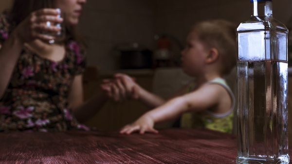 The report's co-author said research shows children exposed to parental drinking at high levels are vulnerable to adverse outcomes (stock image)