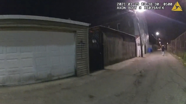 A frame grab from video released by the Civilian Office of Police Accountability (COPA) reportedly shows the shooting of Adam Toledo