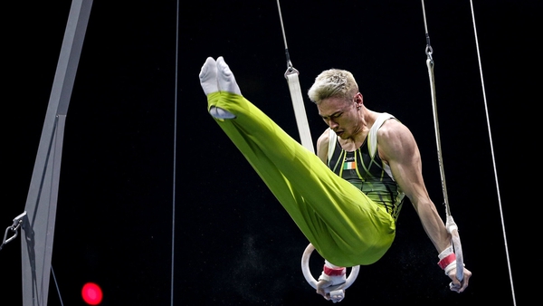 Adam Steele of Ireland competes on the rings