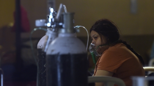 A patient on oxygen at a temporary Covid-19 care centre in New Delhi