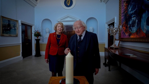 President Michael D Higgins and his wife Sabina light a candle to commemorate the 35th anniversary of the disaster (Pic: @PresidentIRL