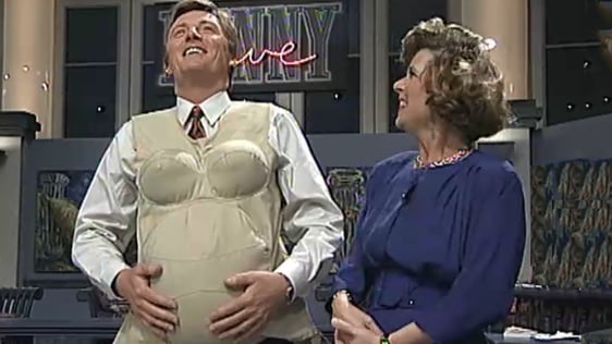 Pat Kenny wears The Empathy Belly invented by Linda Ware, 1991.