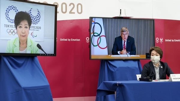 IOC president Thomas Bach Tokyo 2020 Organising Committee president Seiko Hashimoto (R) and Tokyo Governor Yuriko Koike (L) at today's virtual metinf