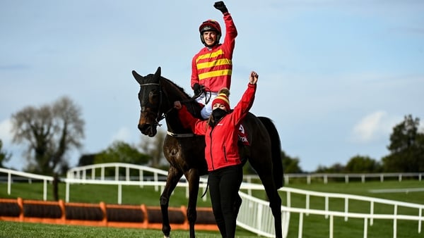 Jockey Patrick Mullins and groom Eilish Byrne celebrate with Klassical Dream