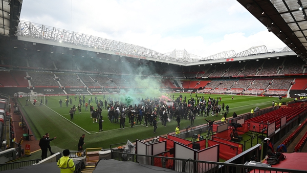 People gained access to the Old Trafford pitch