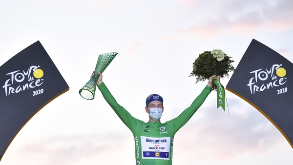 Ireland's Sam Bennett celebrates on the podium after winning the best sprinter's green jersey at the 2020 Tour
