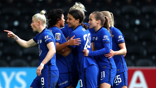 Chelsea's Sam Kerr is mobbed after her second goal