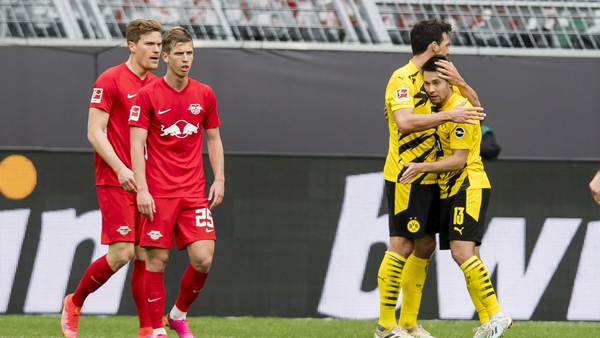 Mats Hummels and Raphael Guerreiro of Borussia Dortmund celebrate the win