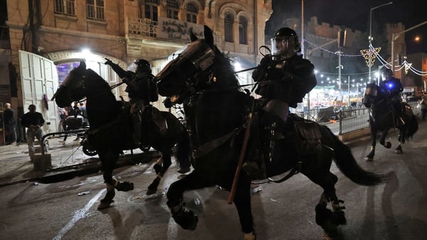 Israeli mounted police deploy to disperse Palestinian protesters outside the Damascus Gate in Jerusalem's Old City