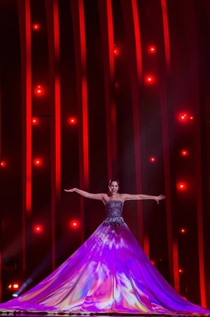 Elina Nechayeva from Estonia performs in Lisbon, 2018, wearing a gigantic projection dress.