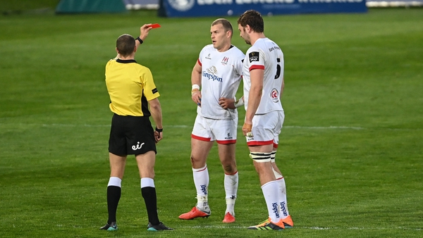 Referee Craig Evans shows a red card to Will Addison