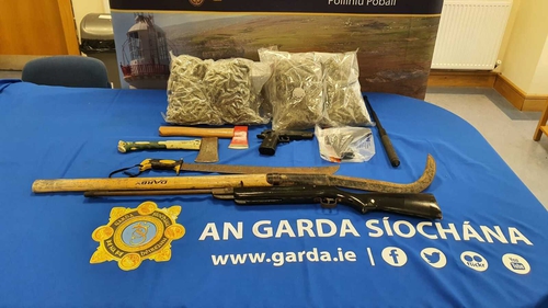 Two imitation firearms were seized in the searches