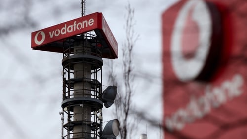 Mobile operator Vodafone has reported a 1.2% drop in full-year adjusted earnings