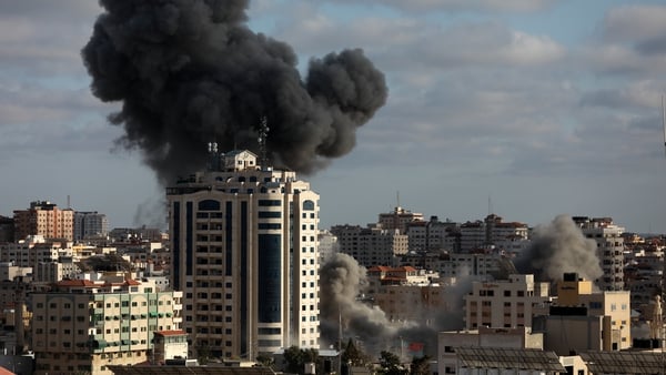 Smoke rises following an Israeli air strike on Gaza City today