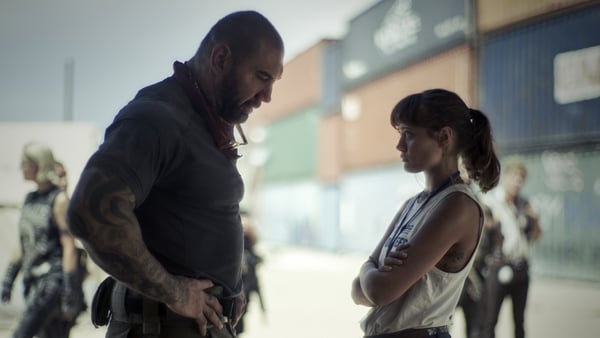Dave Bautista as mercenary Scott Ward and Ella Purnell as aid worker daughter Kate in Army of the Dead - streaming now on Netflix